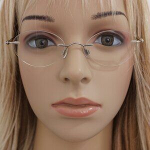 Silhouette 7436 EYEGLASSES FRAMES 130 Rimless Drill Mount